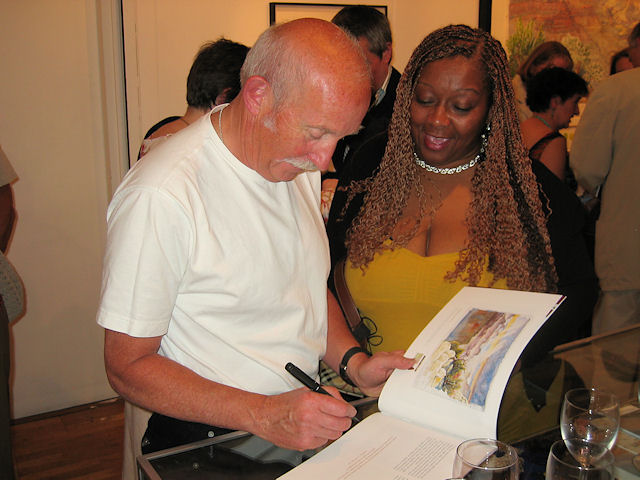 Tony Foster signing a catalogue